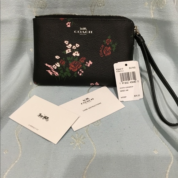 Coach Accessories - Coach floral pattern Wristlet